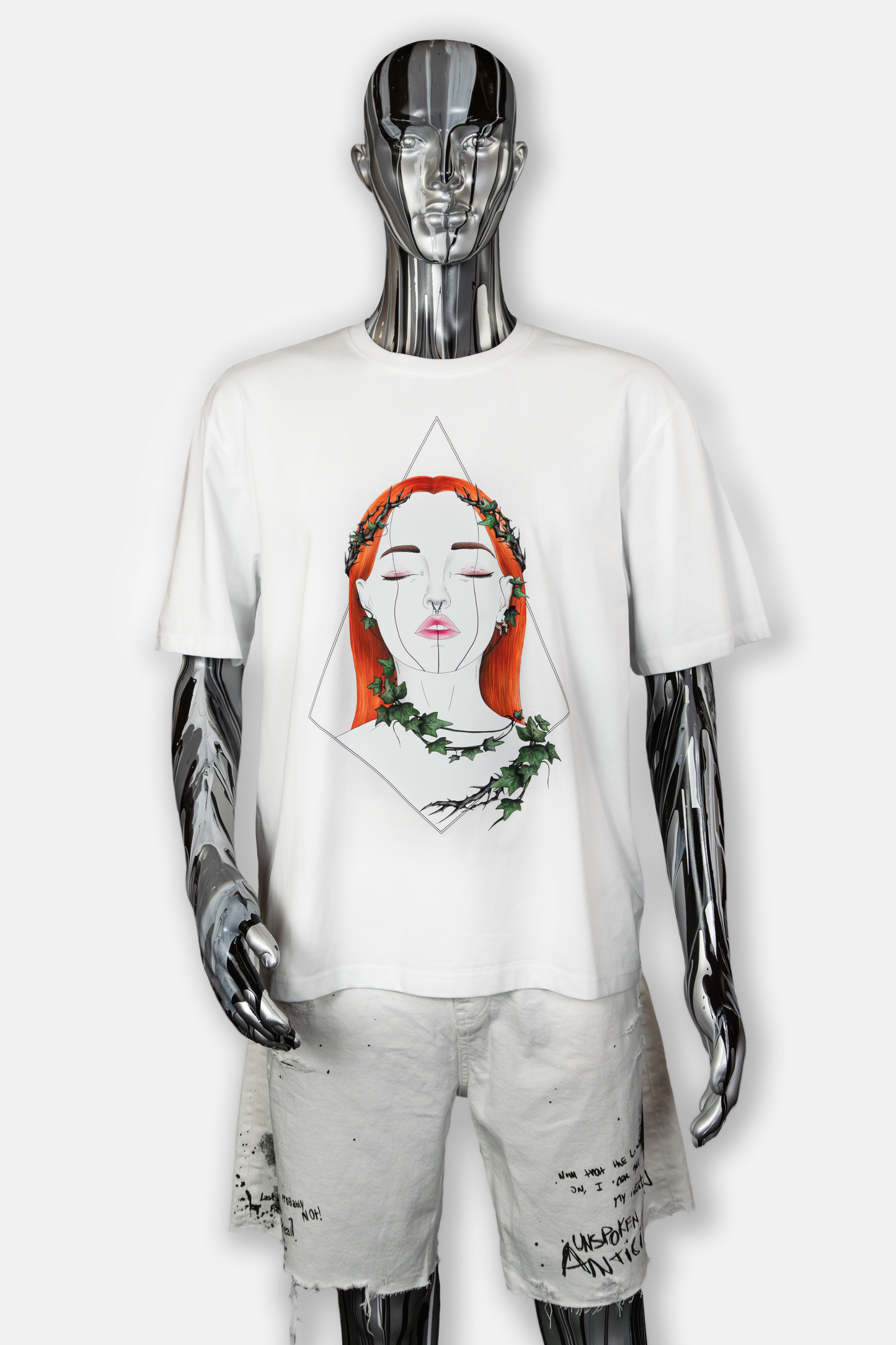 Male mannequin wearing Tangled Ivy Pierced Edition on white T-shirt
