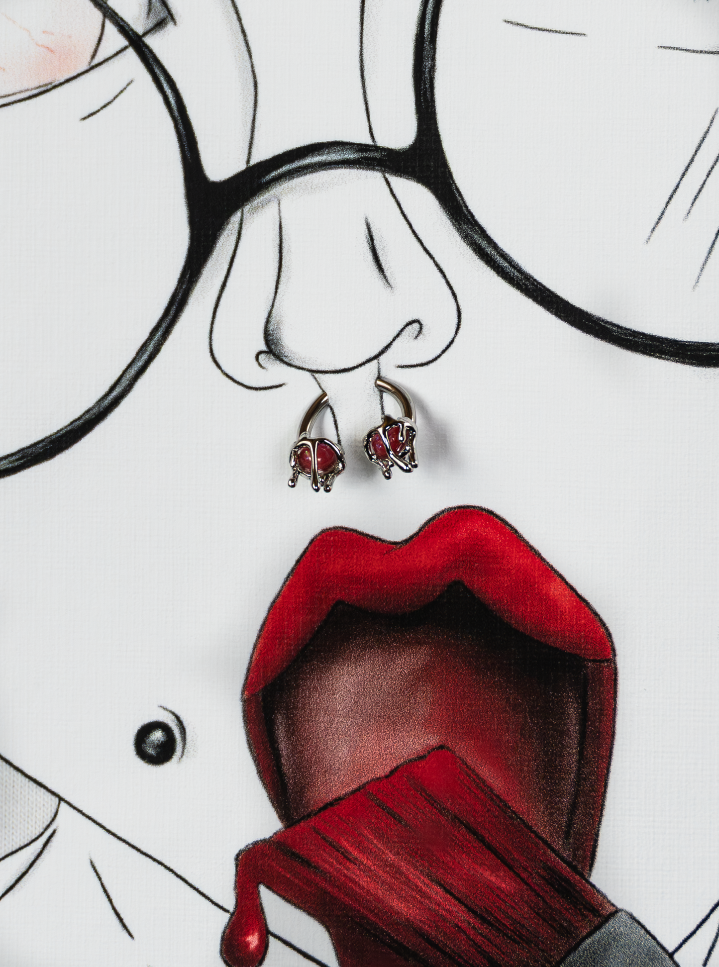 Piercing detail of Painted in Red Pierced Edition