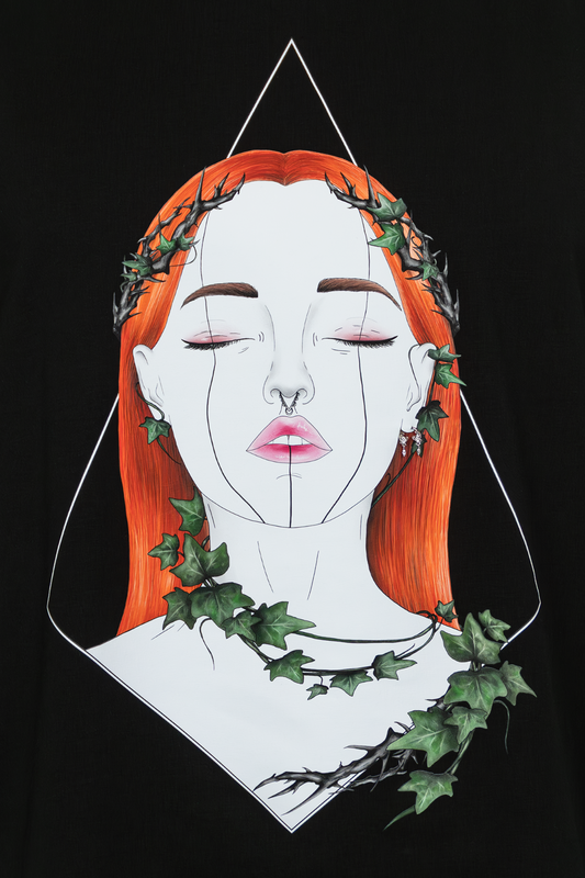 Close-up of Tangled Ivy Pierced Edition on black T-shirt