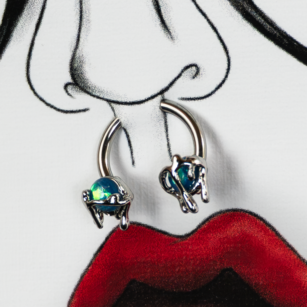 Women's pierced edition is showcasing a unique real piercing detail blended with hand drawn designs
