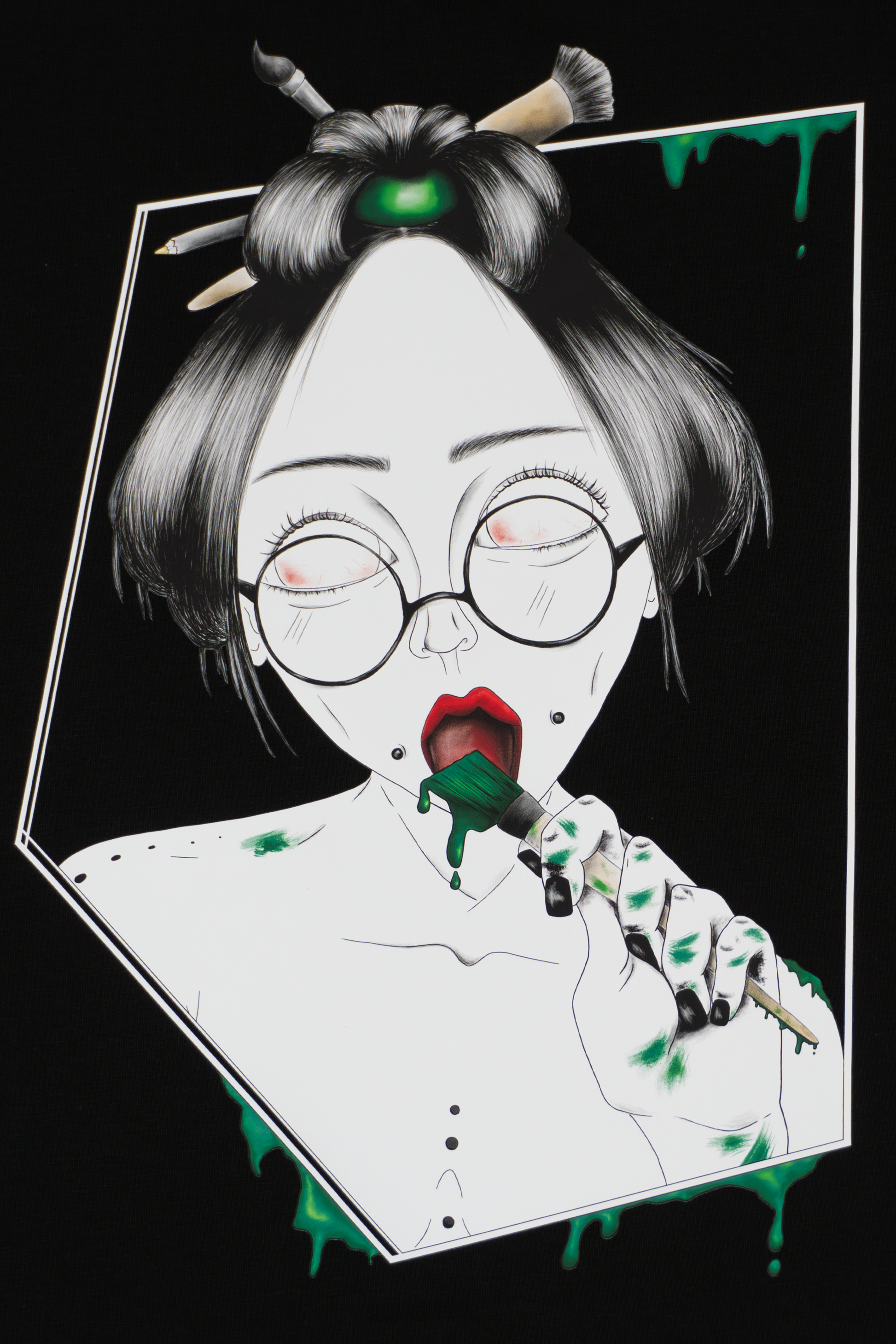 Close-up of Painted in Green design on black T-shirt showing expressive green brushstrokes and line work