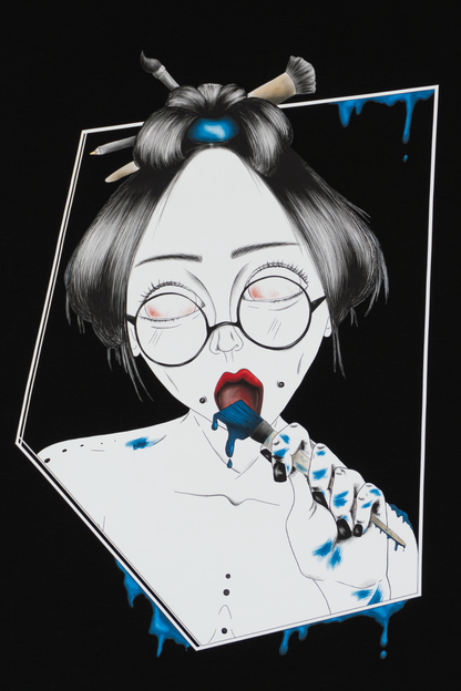 Close-up of Painted in Blue design on black T-shirt showing expressive blue brushstrokes and line work