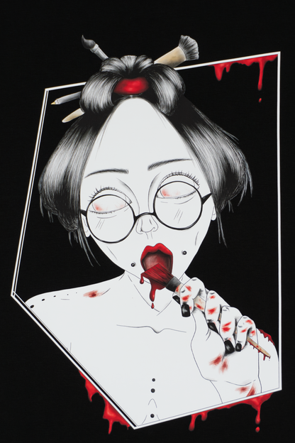 Close-up of Painted in Red design on black T-shirt showing expressive red brushstrokes and line work