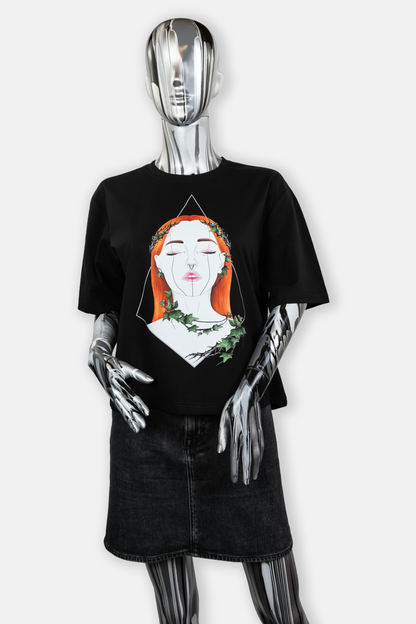 Female mannequin wearing Tangled Ivy statement tee in black