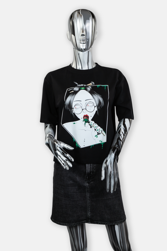 Female mannequin wearing Painted in Green statement tee in black