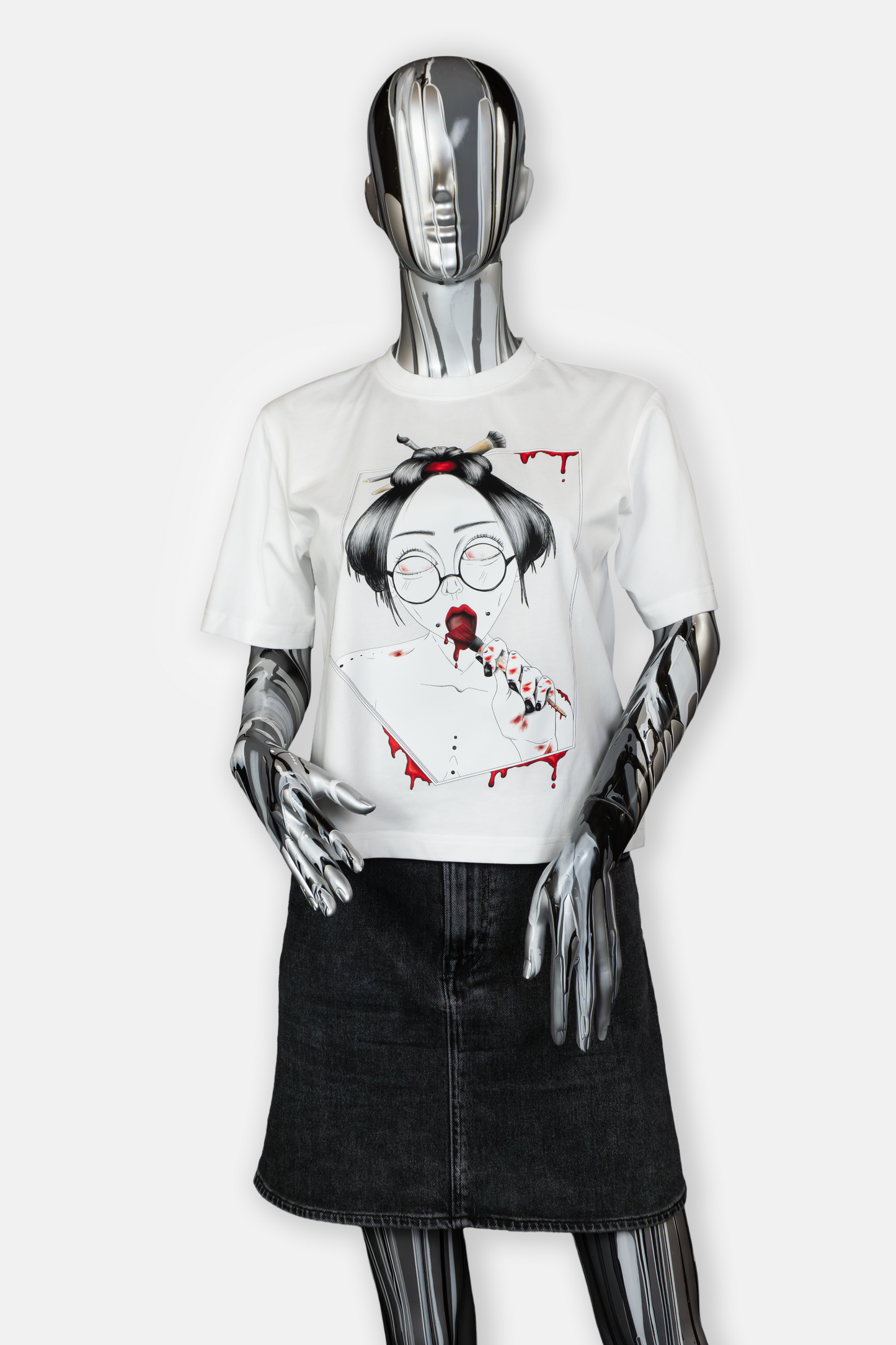 Female mannequin wearing Painted in Red statement tee in white