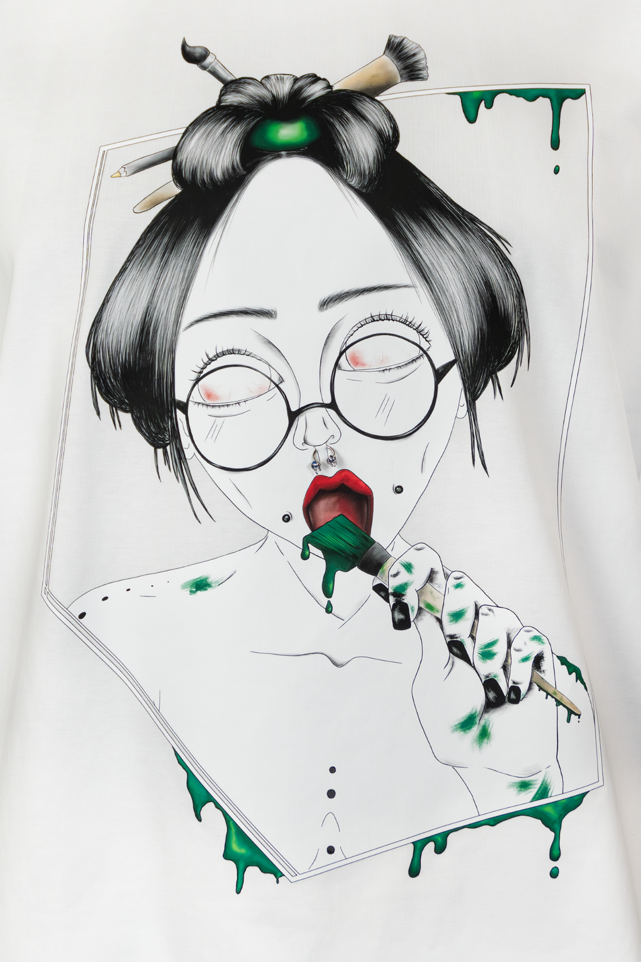 Close-up of Painted in Green Pierced Edition on white T-shirt
