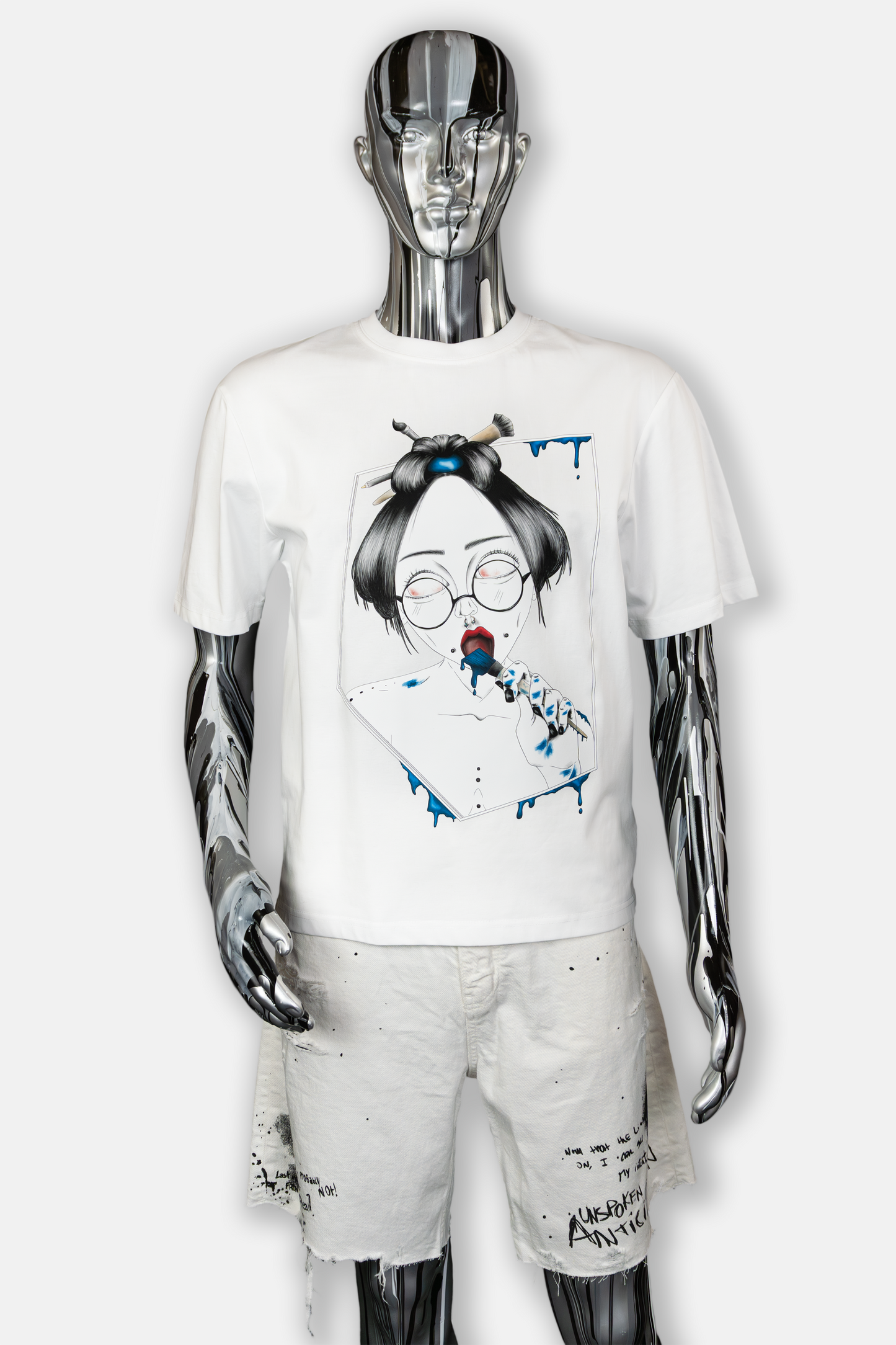 Male mannequin wearing Painted in Blue Pierced Edition on white T-shirt
