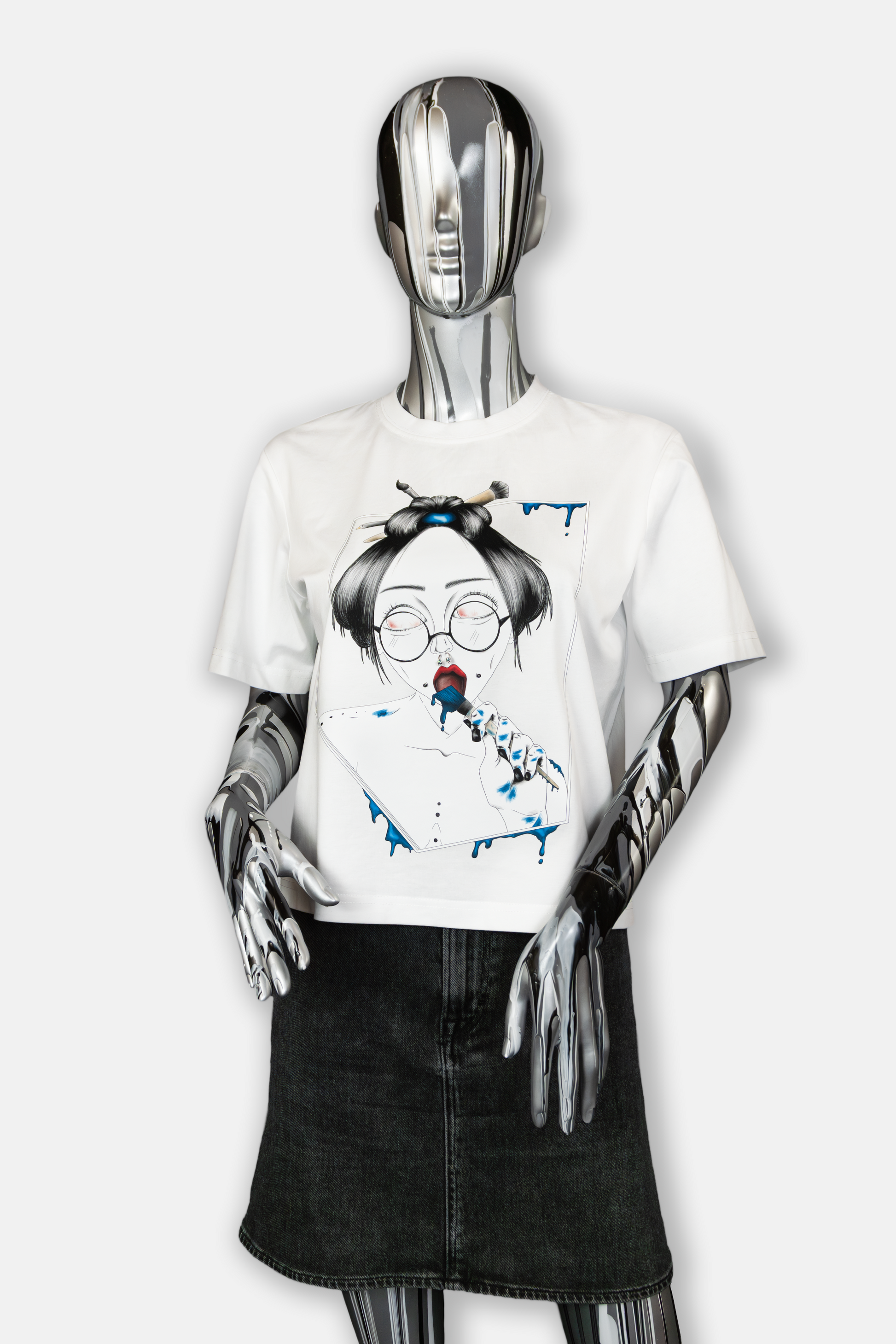 Female mannequin wearing Painted in Blue Pierced Edition on white T-shirt