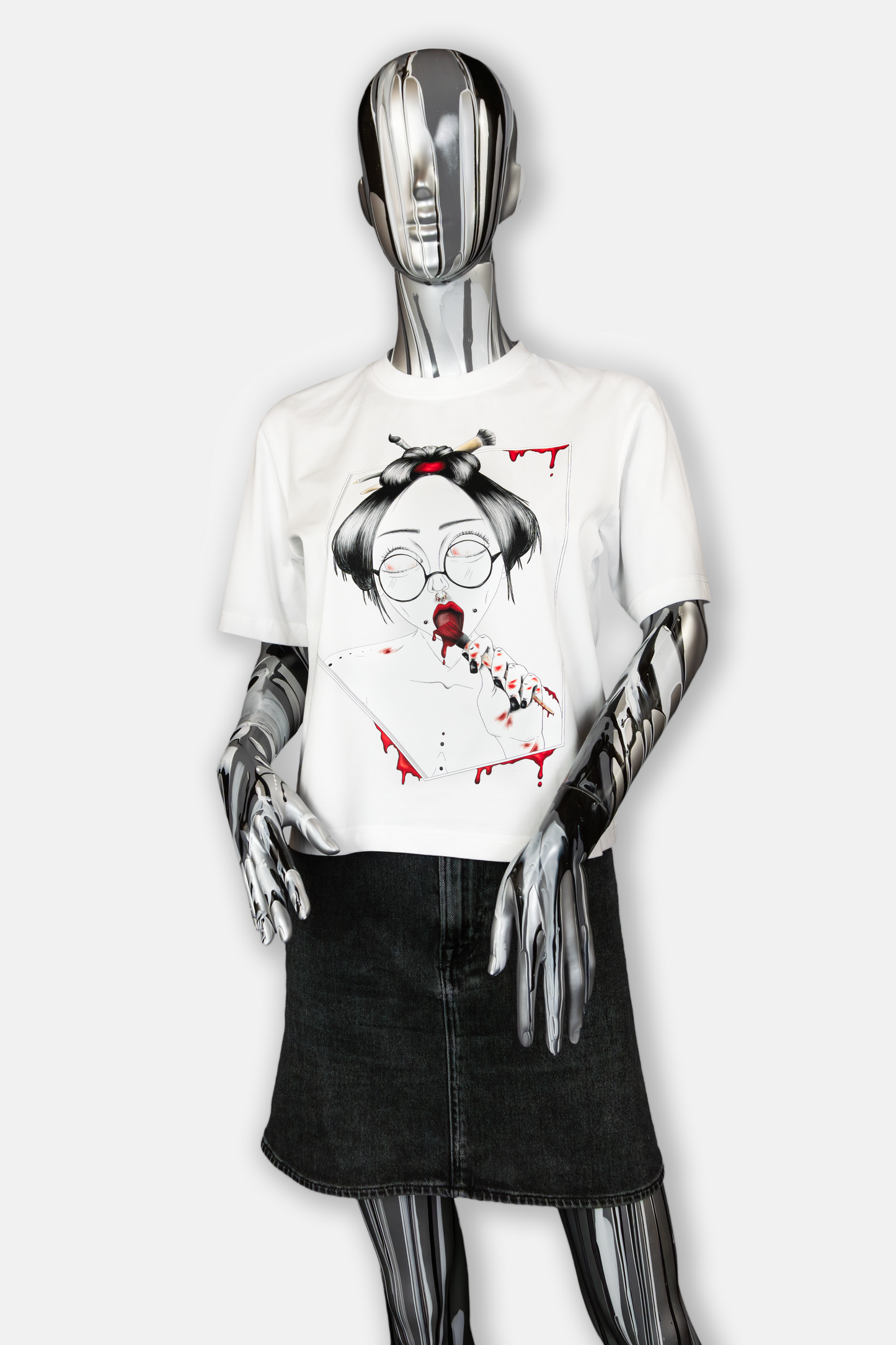 Female mannequin wearing Painted in Red Pierced Edition on white T-shirt