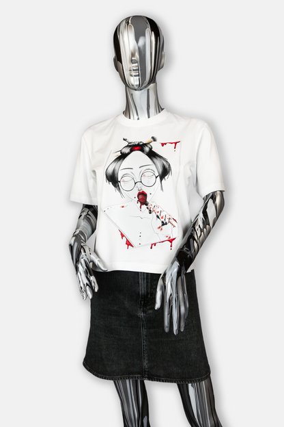 Female mannequin wearing Painted in Red Pierced Edition on white T-shirt