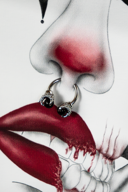 Piercing detail of Trapped in the Darkness Pierced Edition