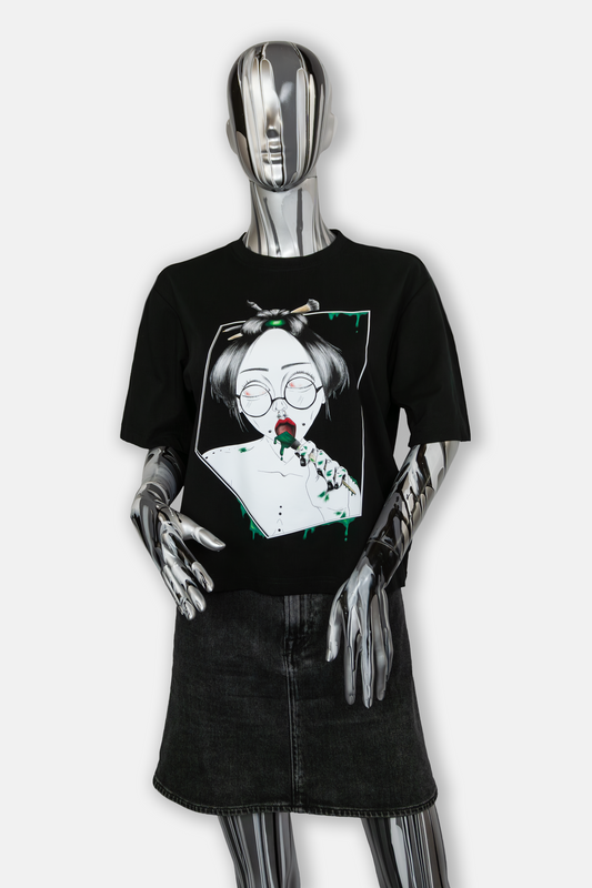 Female mannequin wearing Painted in Green Pierced Edition on black T-shirt