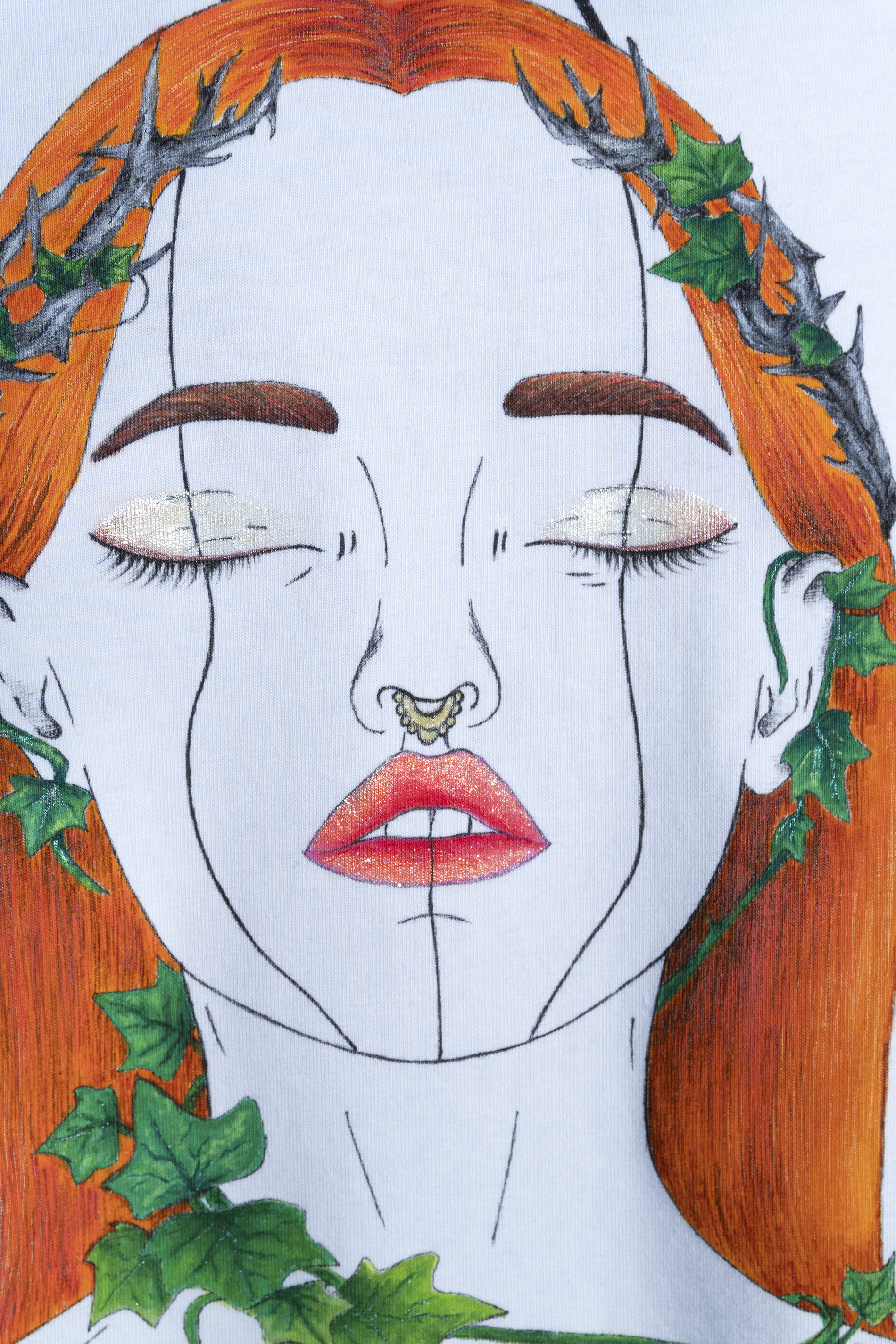 Close up details of the orange hair girl with ivy leaves and shimmery make up. The design is called Tangled Ivy and is hand painted.