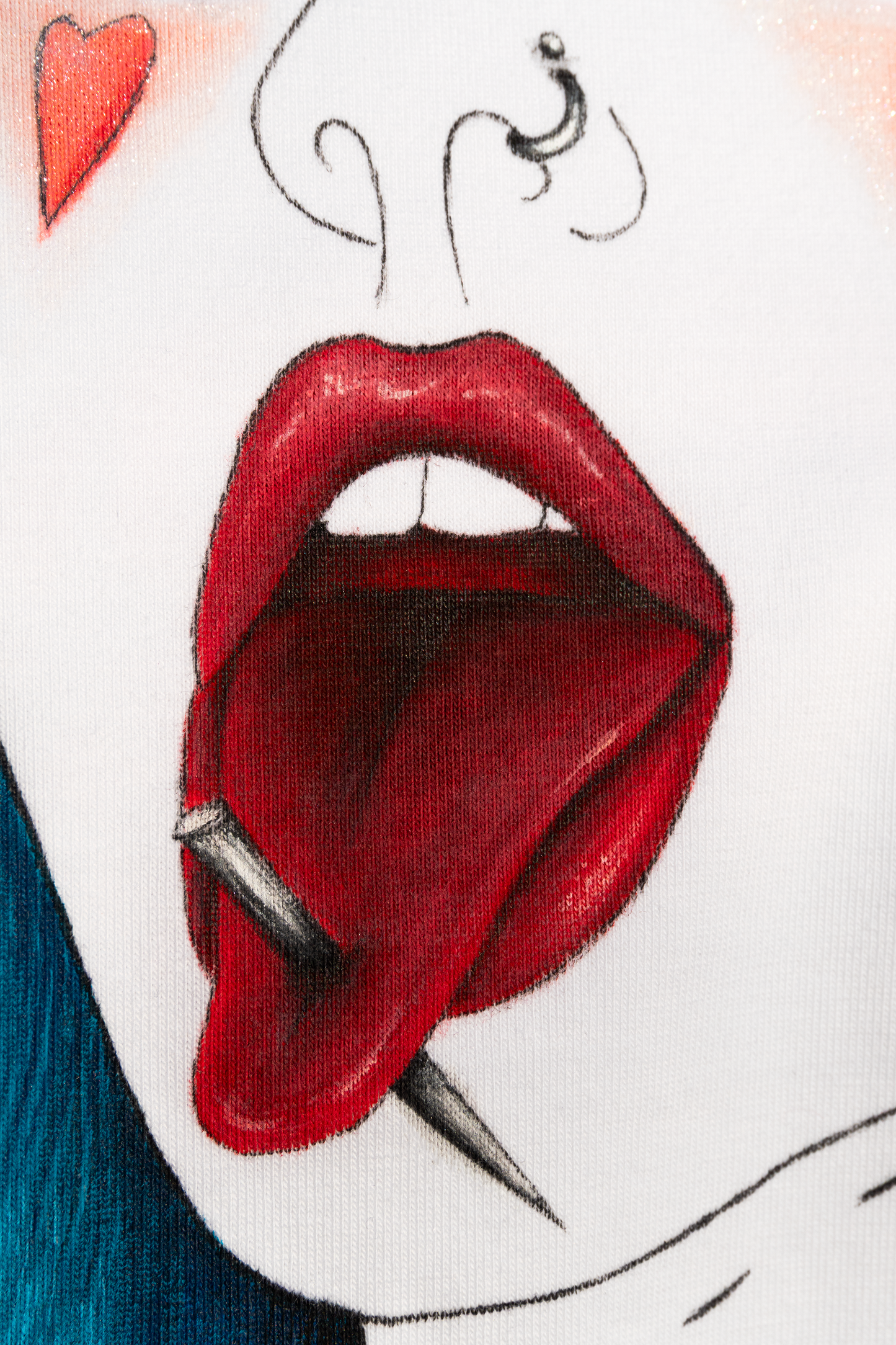 Close up of Pair of Hearts design, the close up is for the mouth of the girl with needle through her tongue. This is hand painted directly on a white tshirt.