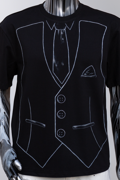 Close up of a Black t-shirt with white outline of a suit and tie on a male mannequin.